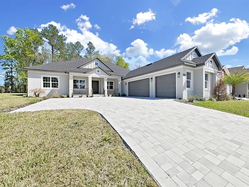 Front exterior of a new home in Southern Hills Plantation, Brooksville, FL, highlighting curb appeal (Image 24).