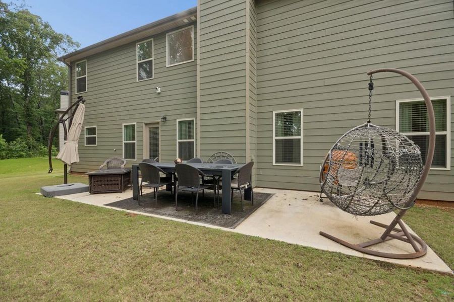 Exterior details and patio area of a home in Nine Oaks, Locust Grove (Image 3). Exterior details and patio area of a home in Nine Oaks, Locust Grove (Image 3).
