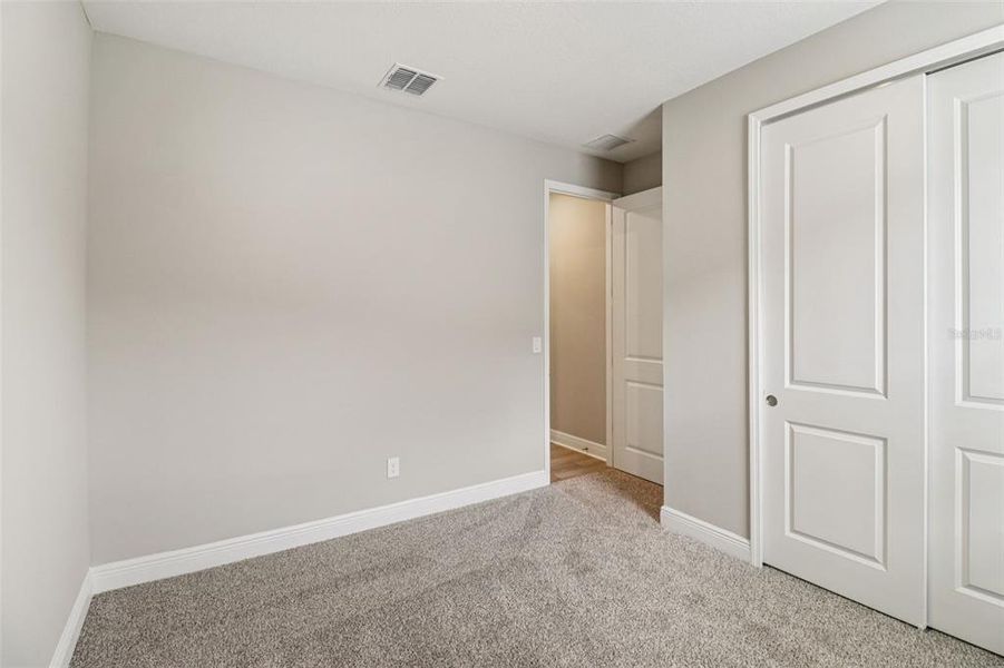 Spacious, unfurnished interior of a new home in Legends Preserve - Signature Series, Daytona Beach (Image 29).