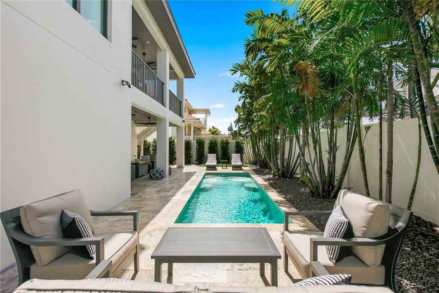 Exterior details and patio area of a home in , Belleair Beach (Image 30).