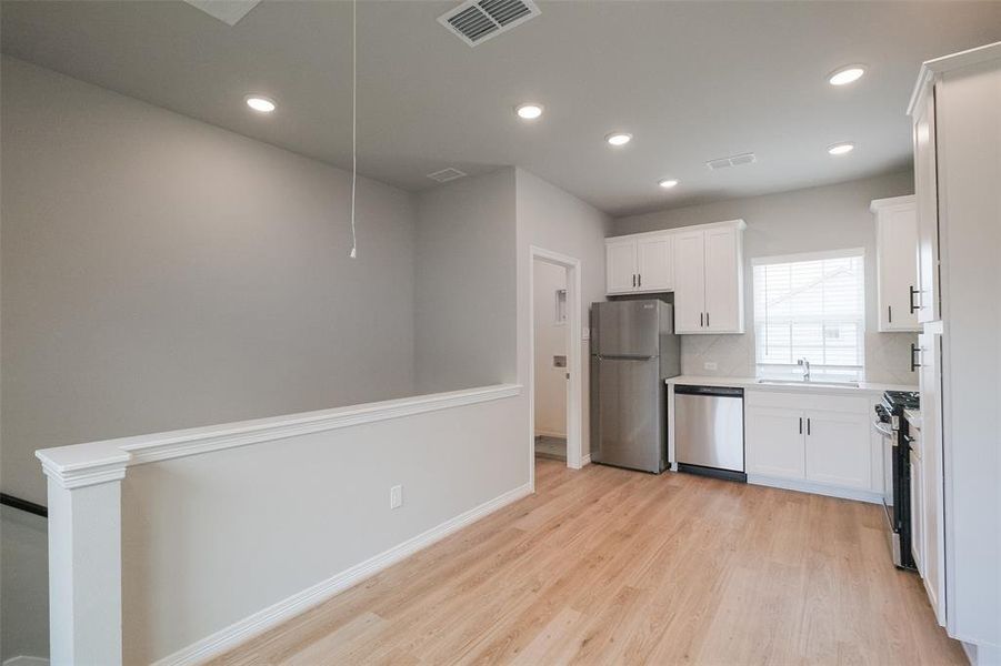 Furnished interior view inside a new home in , Houston (Image 7). Furnished interior view inside a new home in , Houston (Image 7).