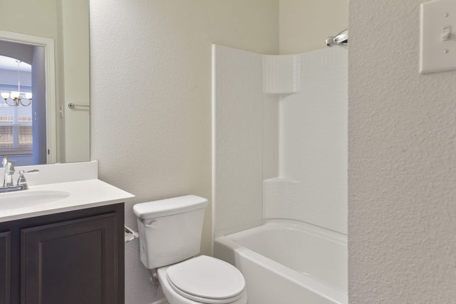 Representative exterior photo of a completed home built from the Cameron by Impression Homes in Heartland, Heartland, TX (Image 19).