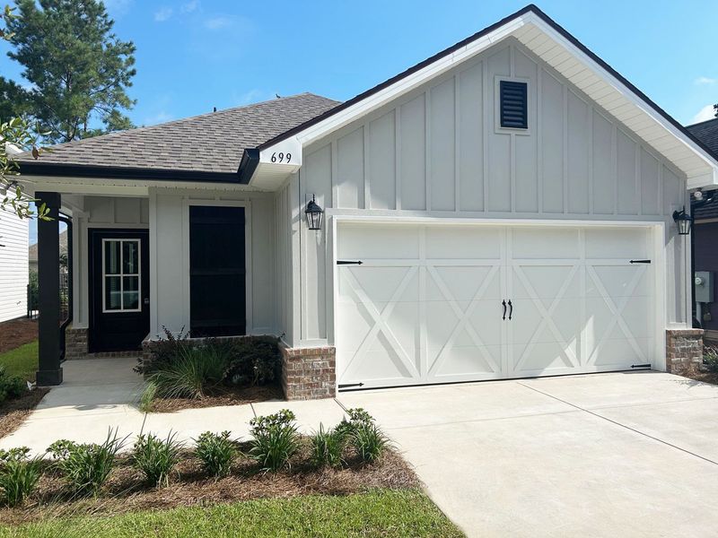 Front exterior of a home in the Crescent and Symphony at Hammock Bay community, located in Freeport, FL (Image 3).