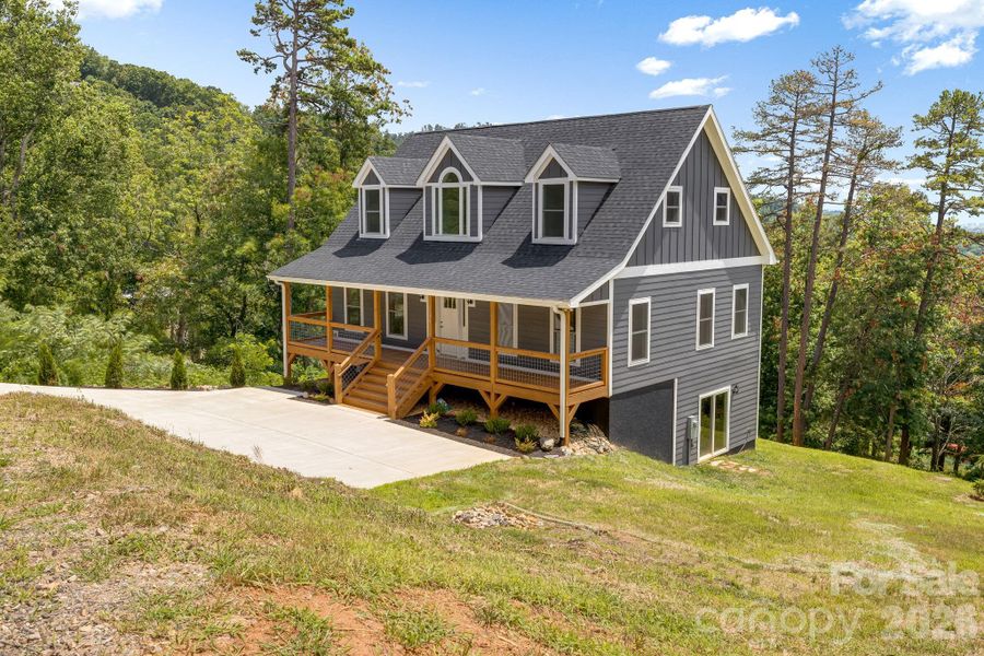 Front exterior of a new home in , Asheville, NC, highlighting curb appeal (Image 2). Front exterior of a new home in , Asheville, NC, highlighting curb appeal (Image 2).