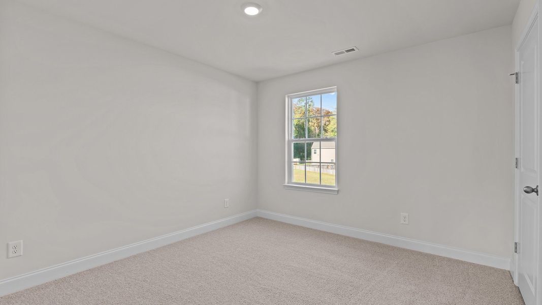 Spacious, unfurnished interior of a new home in Villa Grande, Winterville (Image 21).