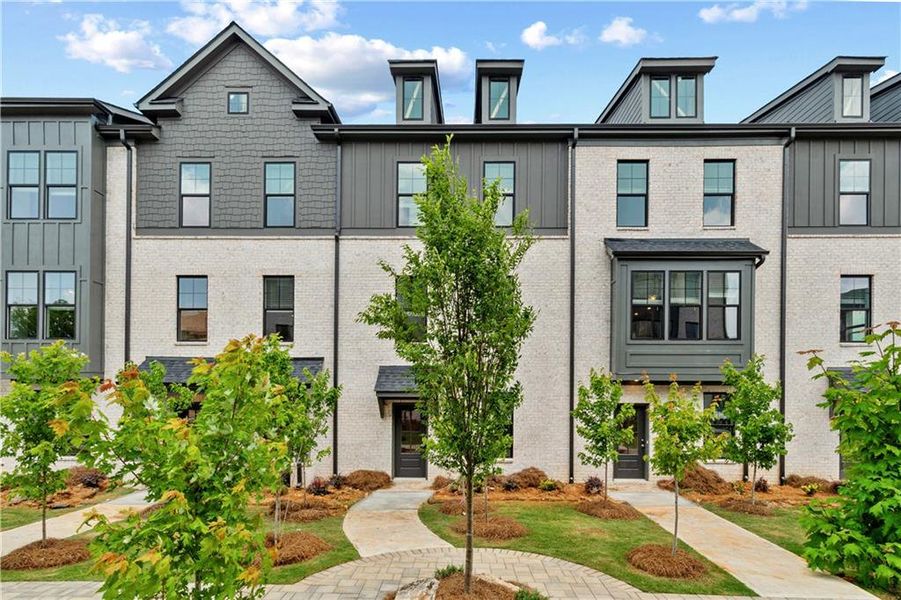 Front exterior of a new home in Silverock, McDonough, GA, highlighting curb appeal (Image 20).