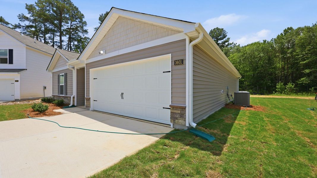 Representative exterior details of a home built from the Freeport II - Express by D.R. Horton in Jetstream Park, Wilson (Image 3).