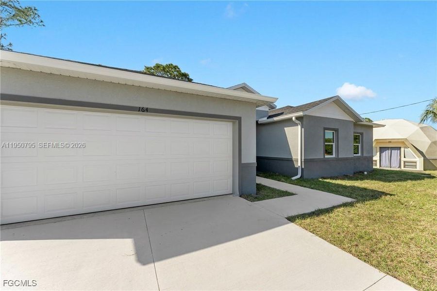 Exterior details and patio area of a home in , Lehigh Acres (Image 3).