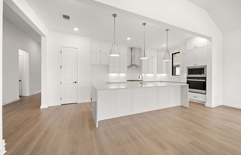 Representative furnished interior of a home built from the Dobbin by Pulte Homes in 6 Creeks, Kyle (Image 6).