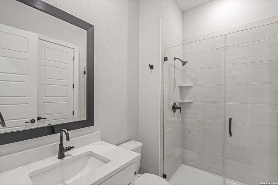 Furnished interior view inside a new home in Potranco West, Castroville (Image 11).