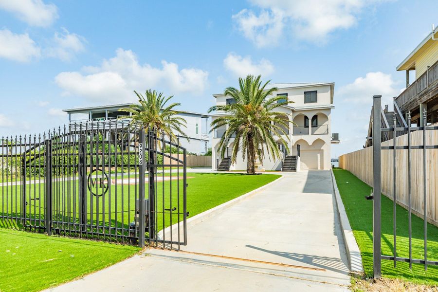 Front exterior of a new home in , Galveston, TX, highlighting curb appeal (Image 20). Front exterior of a new home in , Galveston, TX, highlighting curb appeal (Image 20).