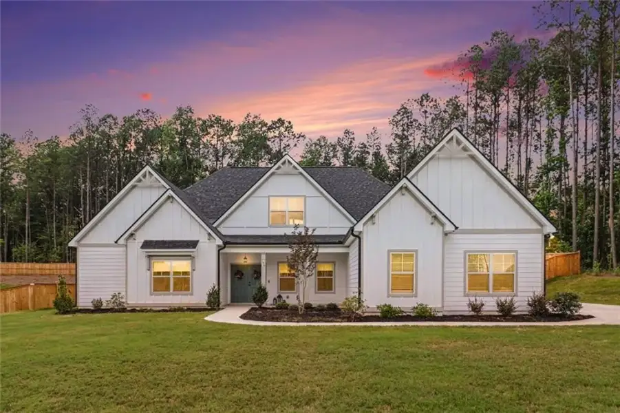 Front exterior of a new home in , Newnan, GA, highlighting curb appeal (Image 28). Front exterior of a new home in , Newnan, GA, highlighting curb appeal (Image 28).