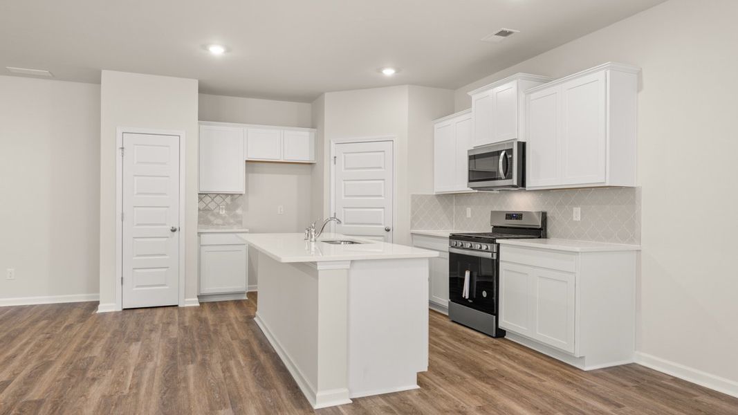 Representative furnished interior of a home built from the Darwin by D.R. Horton in Poplar Preserve, Newnan (Image 8).