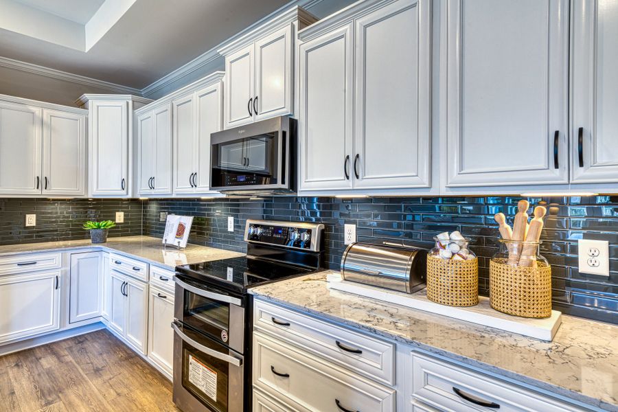 Representative furnished interior of a home built from the Promenade by McKee Homes in The Cottages at 78 North, Sanford (Image 11).