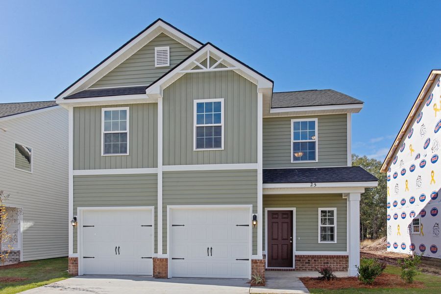 Representative exterior photo of a completed home built from the The Ryon by RTS Homes in Grand Reserve, Hinesville, GA (Image 18).