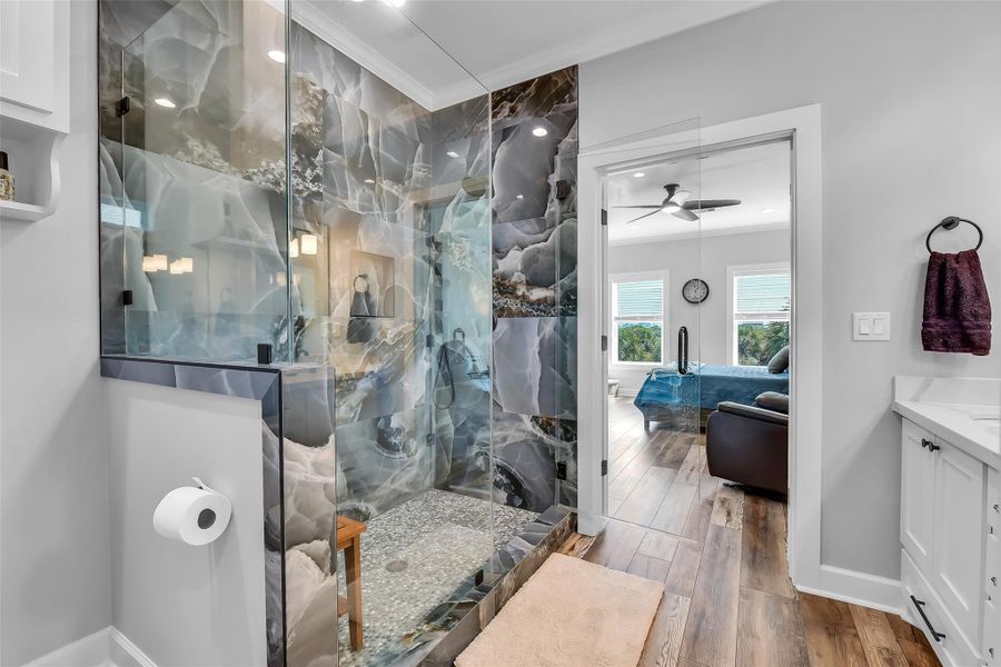 Gorgeous, oversized walk-in tiled shower with rain showerhead