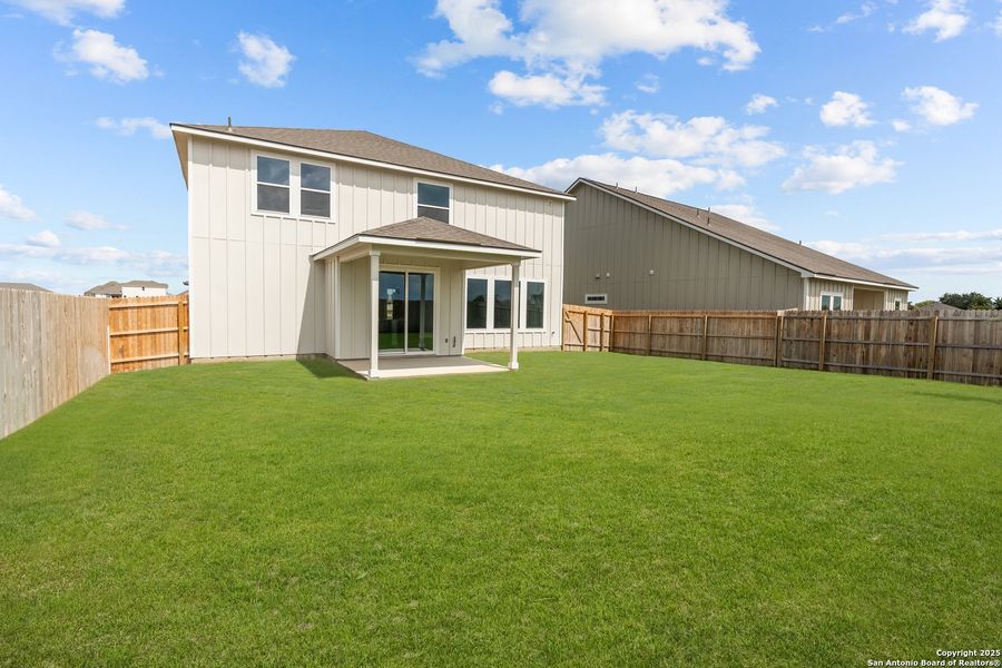 Front exterior of a new home in Weltner Farms 50’s, New Braunfels, TX, highlighting curb appeal (Image 20).