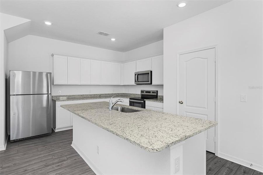 Furnished interior view inside a new home in , Poinciana (Image 6).