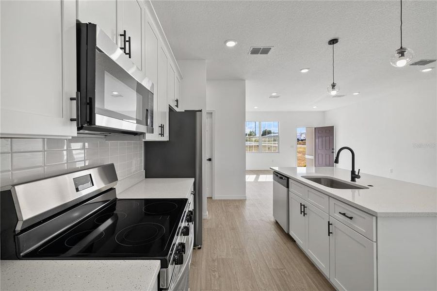 Furnished interior view inside a new home in , Poinciana (Image 7).