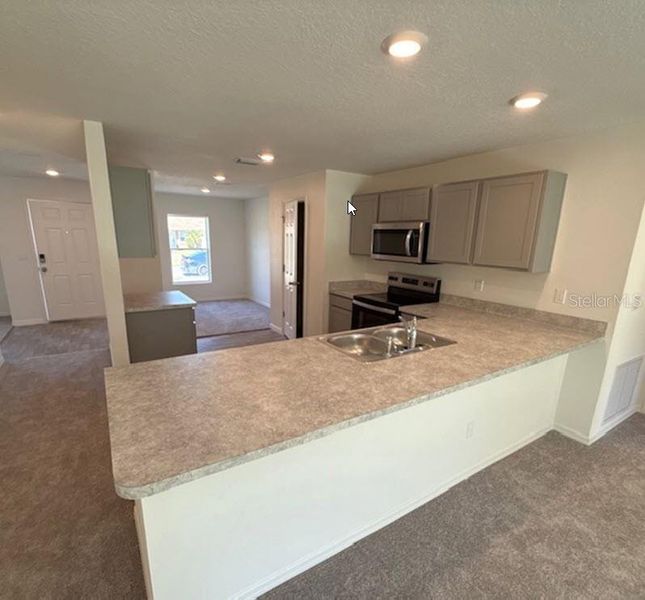 Furnished interior view inside a new home in Palm Coast: Value Collection, Palm Coast (Image 4).