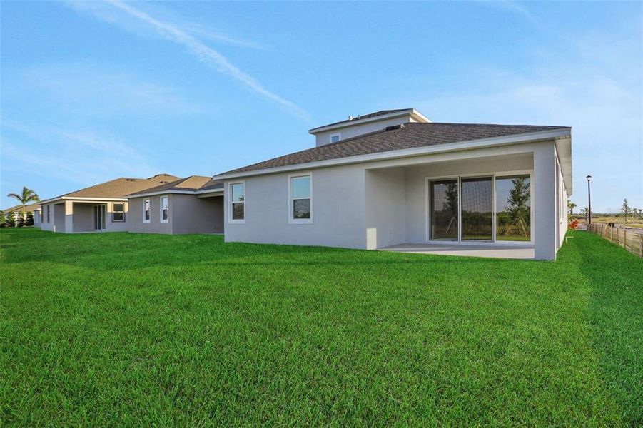 Exterior details and patio area of a home in Turnleaf, Punta Gorda (Image 3).
