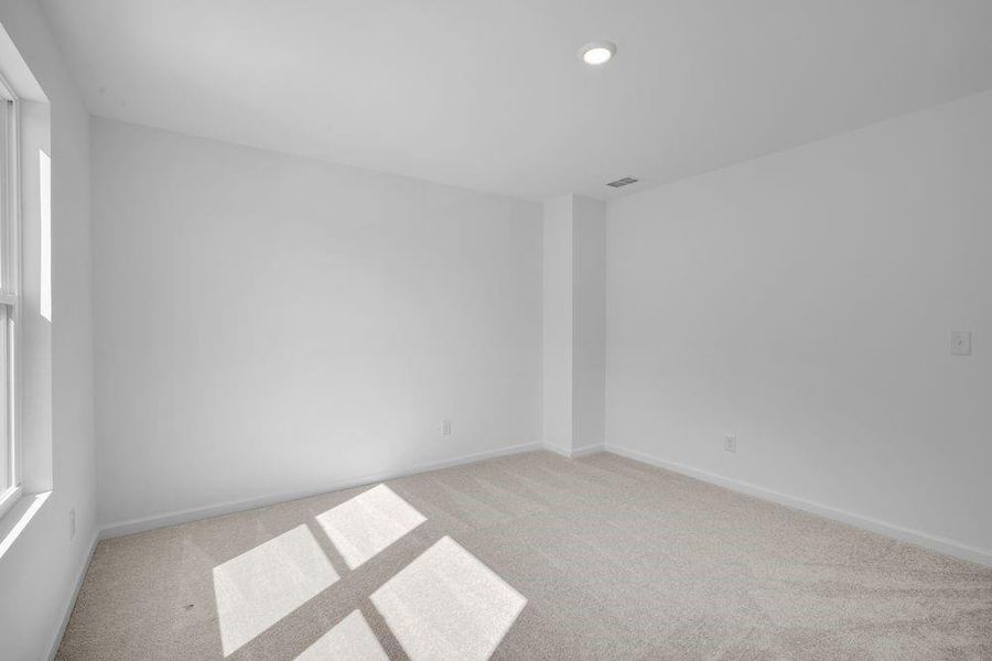 Spacious, unfurnished interior of a new home in Heritage River, Euharlee (Image 28).