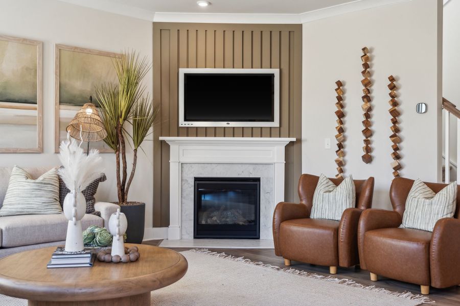 A living room with a fireplace. A living room with a fireplace.