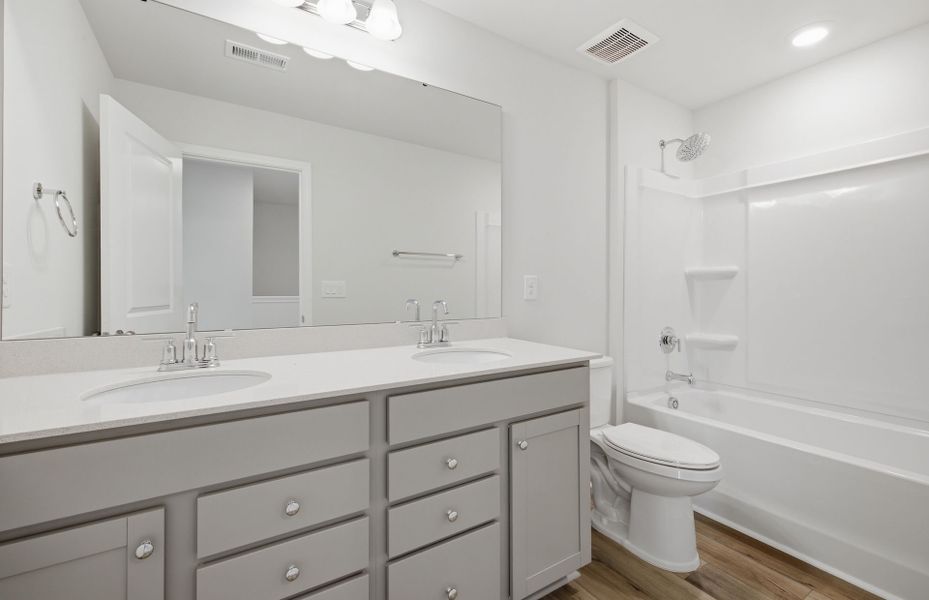 Furnished interior view inside a new home in Saunders Farm, Willow Spring (Image 10).