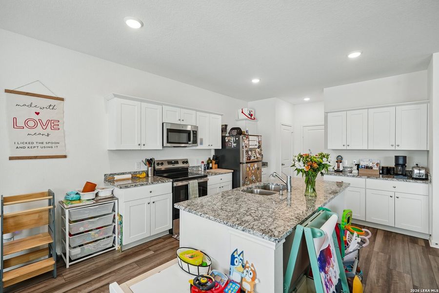 Furnished interior view inside a new home in Hennersby Hollow, San Antonio (Image 9).