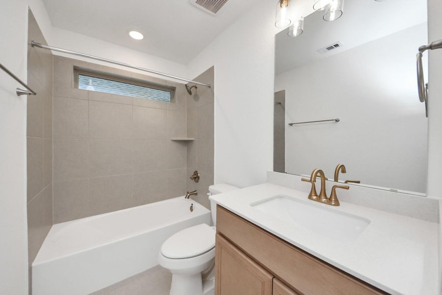 Furnished interior view inside a new home in Elyson, Katy (Image 9).