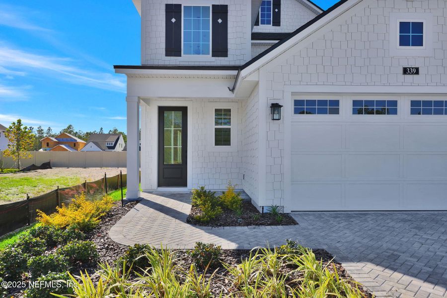 Exterior details and patio area of a home in Seabrook Village at Seabrook, Ponte Vedra (Image 26).