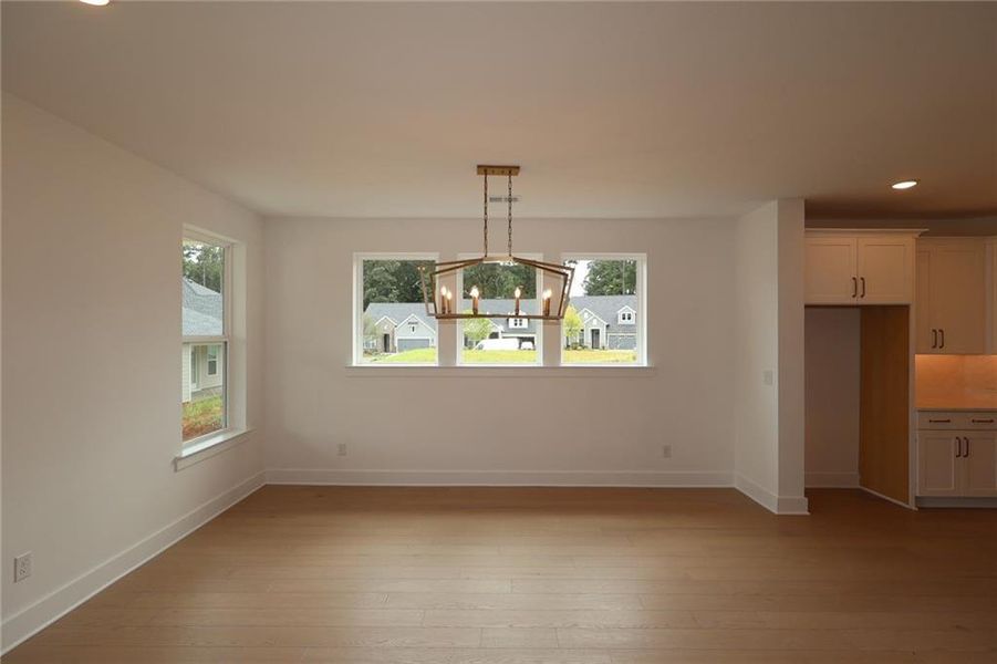 Spacious, unfurnished interior of a new home in Maple Grove at Towne Lake, Woodstock (Image 9).