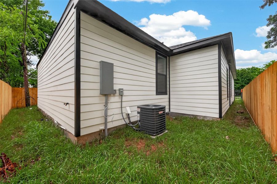 Exterior details and patio area of a home in , Houston (Image 4). Exterior details and patio area of a home in , Houston (Image 4).