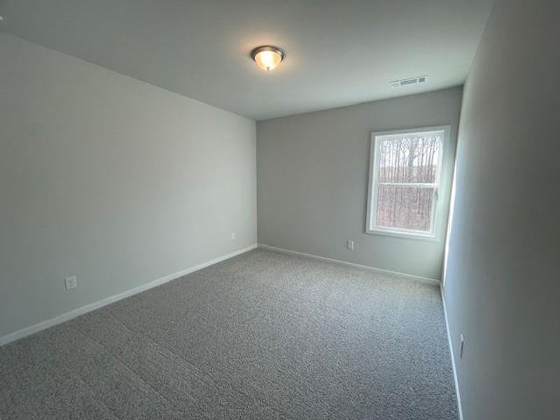 Spacious, unfurnished interior of a new home in Ponderosa Farms Estates, Gainesville (Image 28).