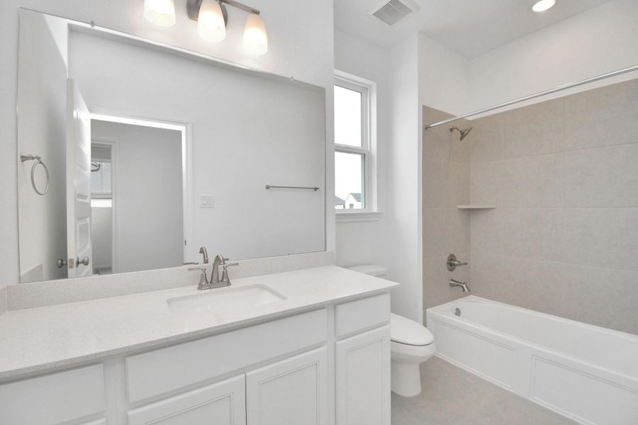 Furnished interior view inside a new home in Elyson, Katy (Image 13).