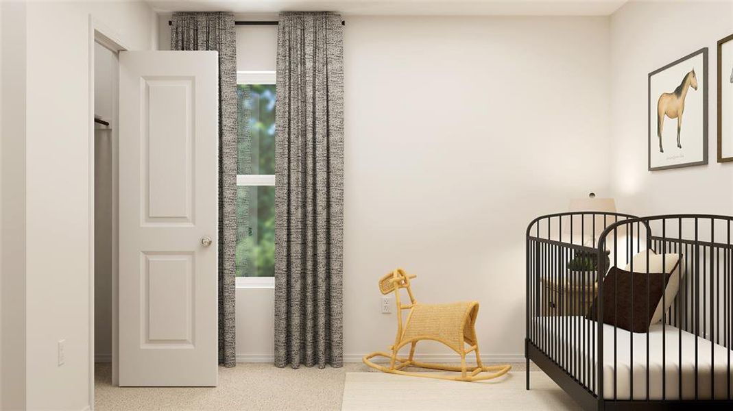 Bedroom with carpet flooring and a nursery area