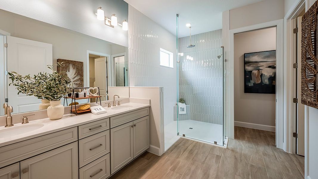 Representative furnished interior of a home built from the Farnese by Taylor Morrison in Esplanade Lake Club, Fort Myers (Image 12).