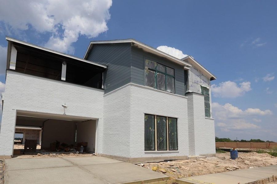Front exterior of a new home in Easthaven at Bridgeland Central - Horizon Collection, Cypress, TX, highlighting curb appeal (Image 1).