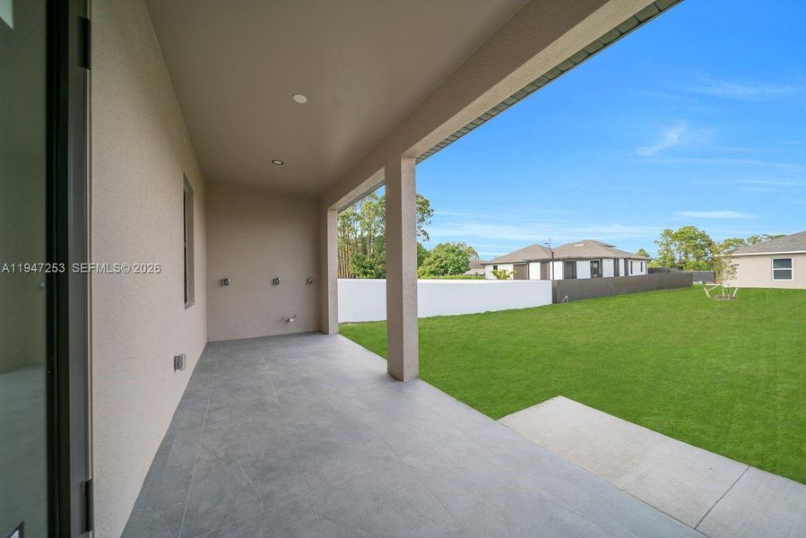 Exterior details and patio area of a home in , Lehigh Acres (Image 4).