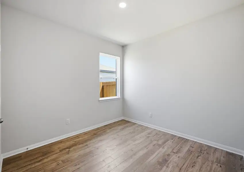 Alternate view of secondary bedroom with window in Montgomery floor plan