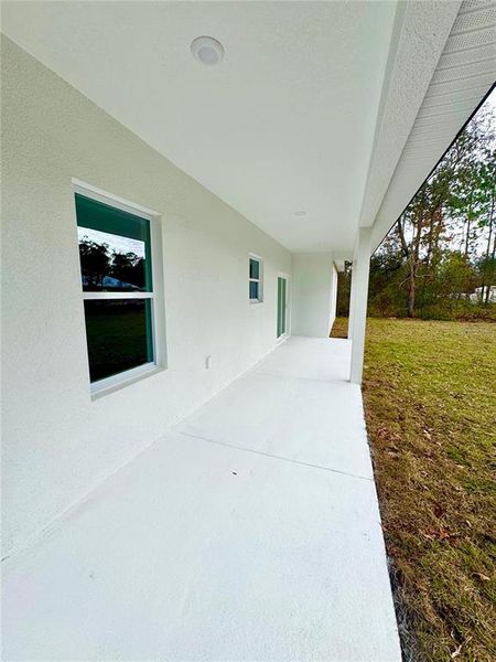 Exterior details and patio area of a home in , Citrus Springs (Image 22).