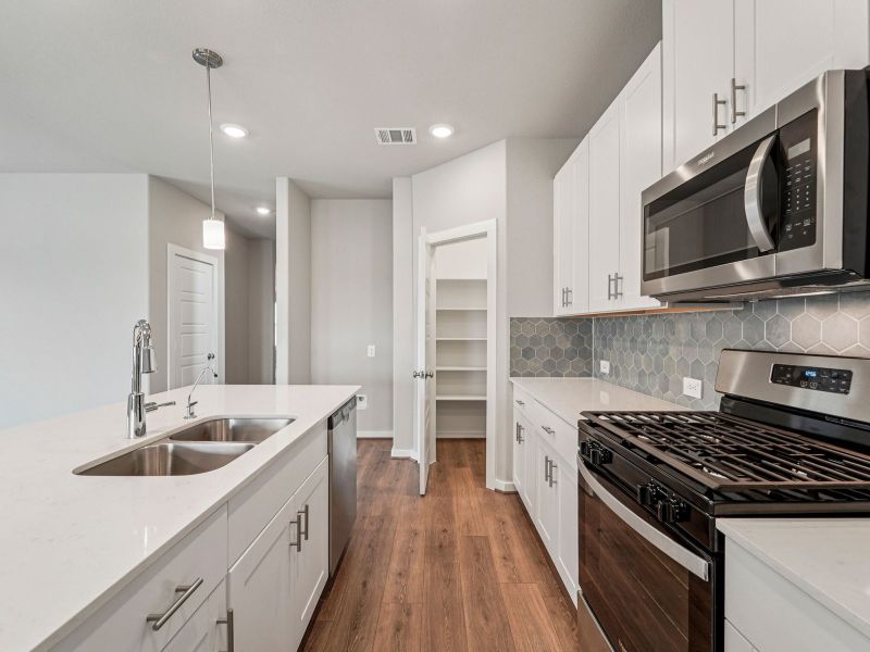 Furnished interior view inside a new home in Granger Pointe - Premier Series, Conroe (Image 5).