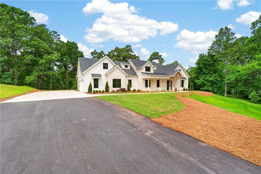 Front exterior of a new home in , Ellijay, GA, highlighting curb appeal (Image 30). Front exterior of a new home in , Ellijay, GA, highlighting curb appeal (Image 30).