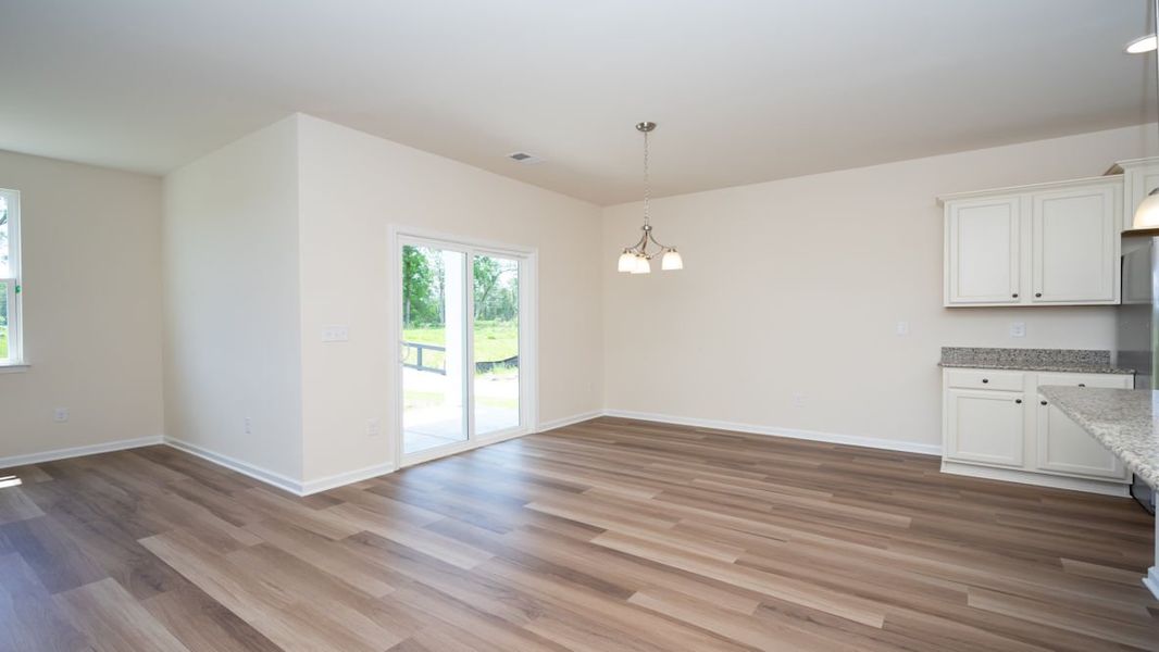 Representative unfurnished interior of a home built from the CALI by D.R. Horton in Lochaven, Conway (Image 26).