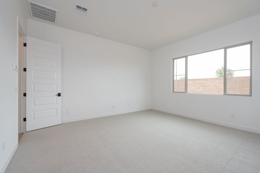Spacious, unfurnished interior of a new home in Waterston Central, Gilbert (Image 18).