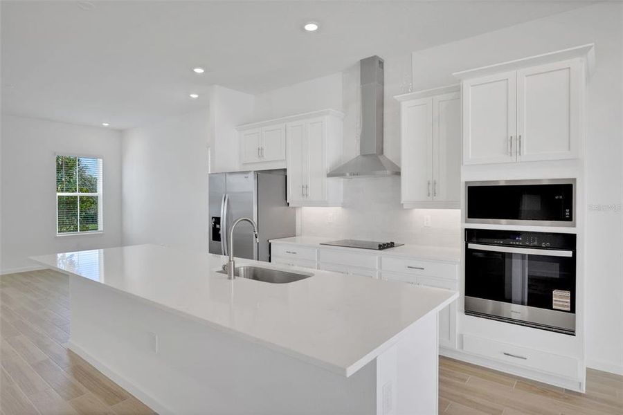 Furnished interior view inside a new home in Serenade at Ovation, Winter Garden (Image 17).