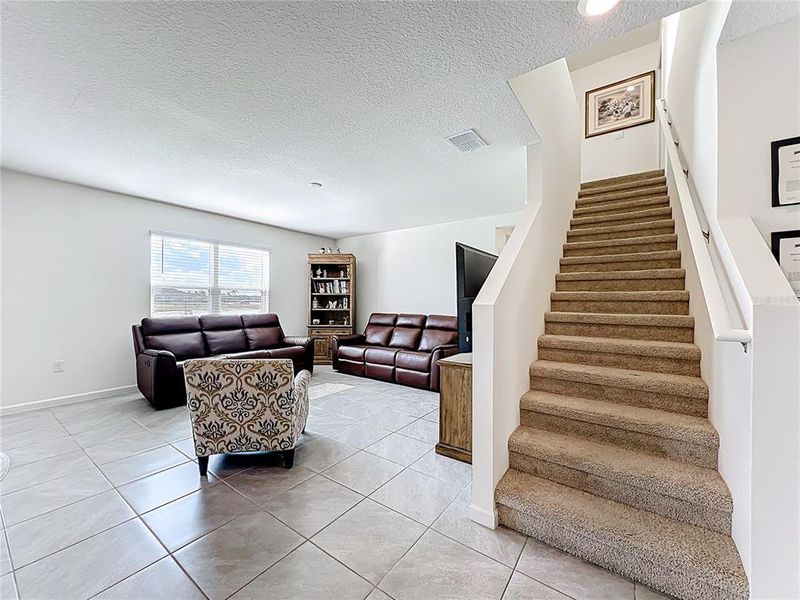 Furnished interior view inside a new home in Cypress Bay West, Palm Bay (Image 7).