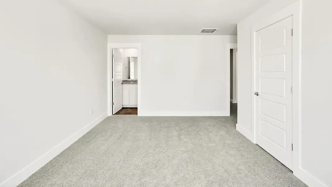 Spacious, unfurnished interior of a new home in The Cove at Indigo Preserve Townhomes, Leland (Image 13).