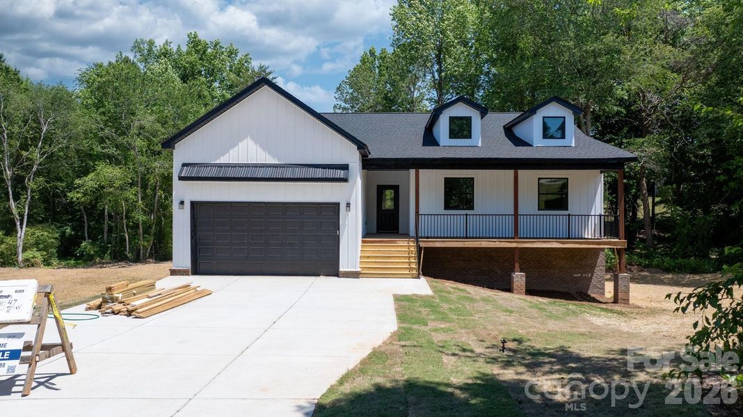 Front exterior of a new home in , Taylorsville, NC, highlighting curb appeal (Image 15).