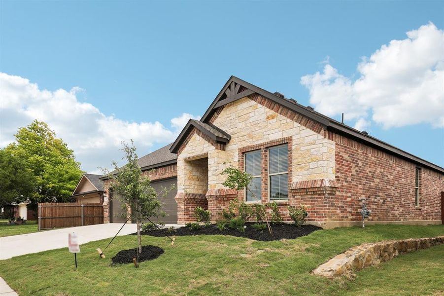 Front exterior of a new home in , Alvarado, TX, highlighting curb appeal (Image 15). Front exterior of a new home in , Alvarado, TX, highlighting curb appeal (Image 15).
